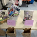 A photo of a few Breaking the Silence Mystery Bingo prizes.