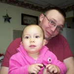 Terry holding Rianna.