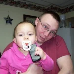 Rianna and her father just hanging out at home.