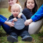 Easter photo of Rianna with her brother and sister.