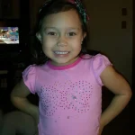 Rianna posing at such a young age, showing off her attitude.