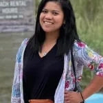 Rose posing on the beach.