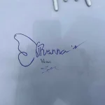 Our logo drawn on a hood of one of the car owner's. Drawn by Liam McDonough.